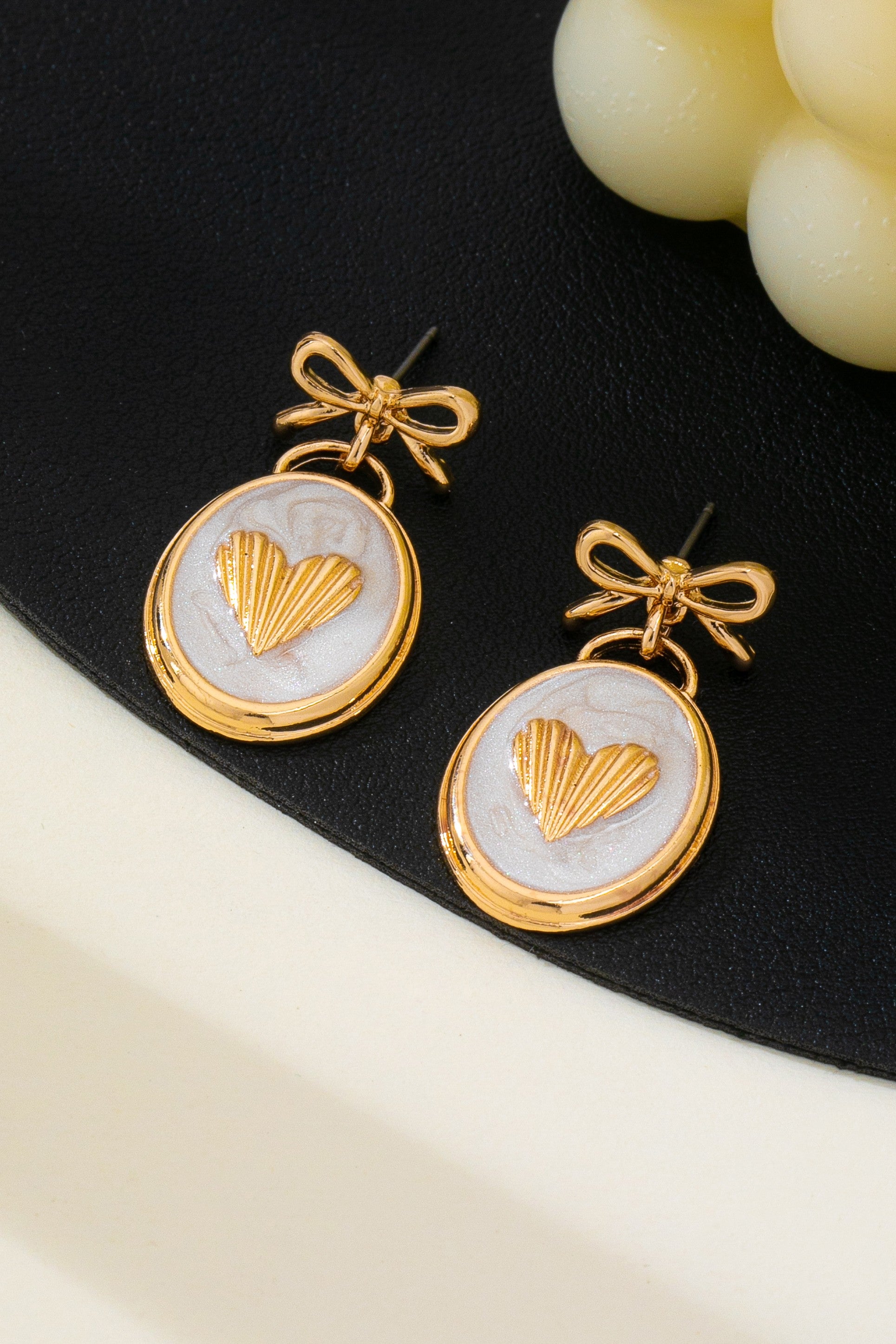 OVAL GOLD HEART BOW EARRINGS