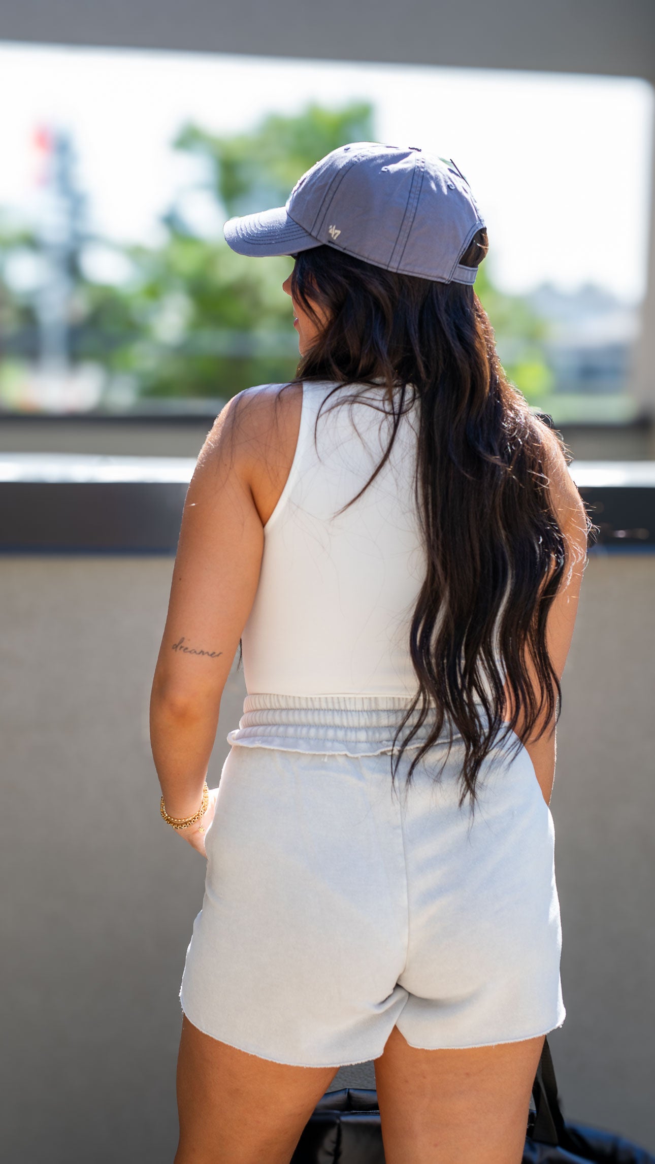 NEW NIKITA BUTTER BODYSUIT WITH CUPS (WHITE)